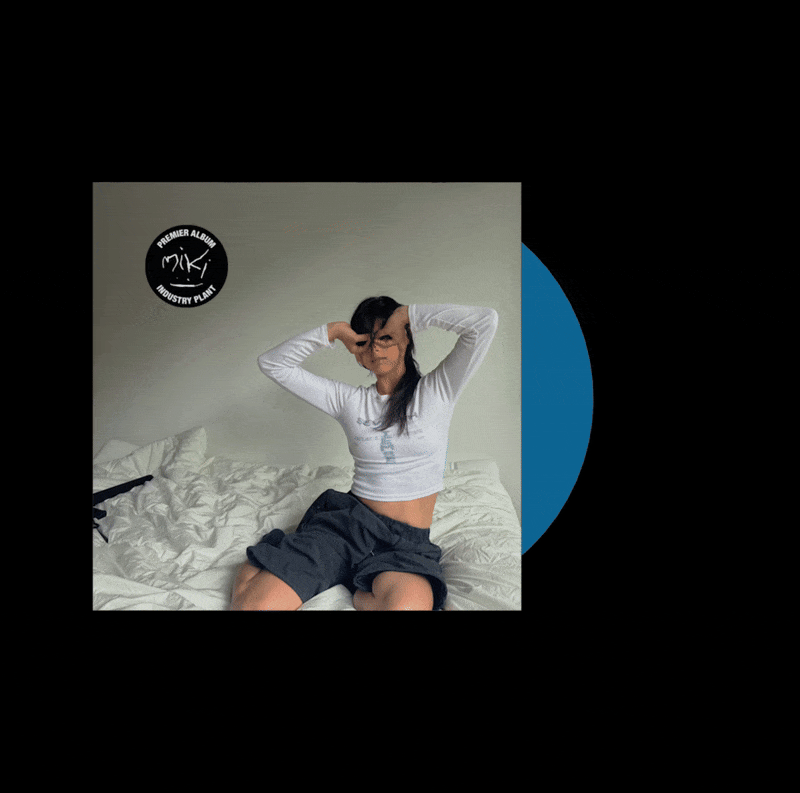 Vinyle bleu + dédicace + porte-clé USB